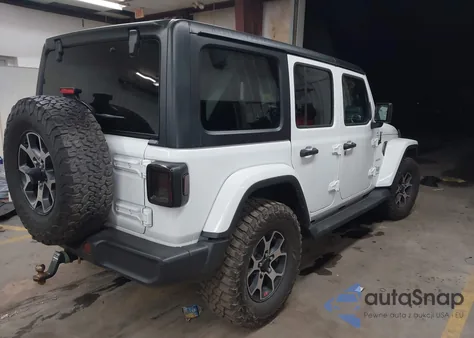 2023 Jeep Wrangler 4-Door Sahara 4X4 from USA, damaged, VIN 1C4HJXEN5PW529786